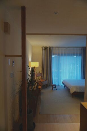 Imagen de la habitación del Hotel At Corner. Foto 13