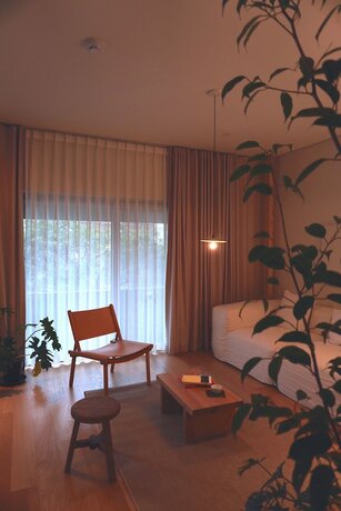 Imagen de la habitación del Hotel At Corner. Foto 26