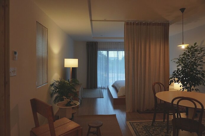 Imagen de la habitación del Hotel At Corner. Foto 32