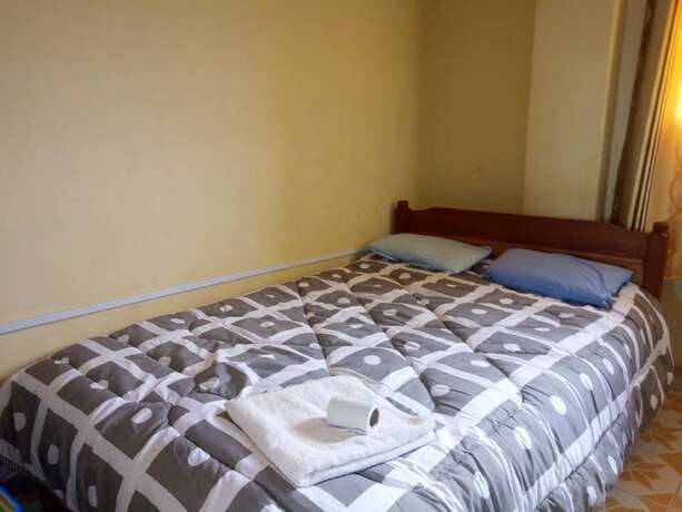 Imagen de la habitación del Hotel At Ease Guest House. Foto 10