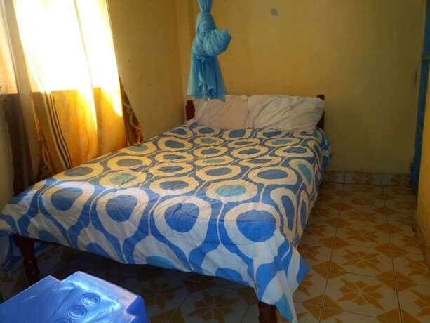 Imagen de la habitación del Hotel At Ease Guest House. Foto 11