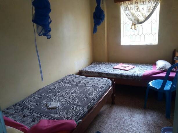 Imagen de la habitación del Hotel At Ease Guest House. Foto 12