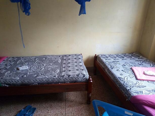 Imagen de la habitación del Hotel At Ease Guest House. Foto 13