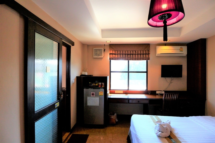 Imagen de la habitación del Hotel At Home At Chiang Mai. Foto 5