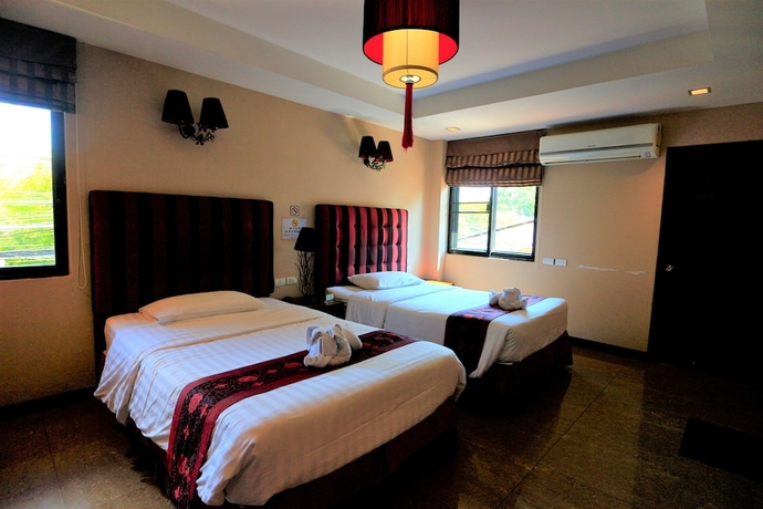 Imagen de la habitación del Hotel At Home At Chiang Mai. Foto 6