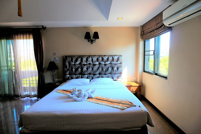 Imagen de la habitación del Hotel At Home At Chiang Mai. Foto 7