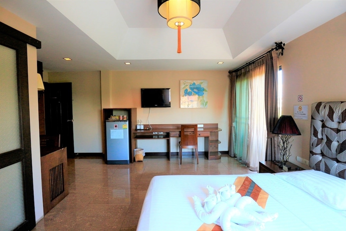 Imagen de la habitación del Hotel At Home At Chiang Mai. Foto 8