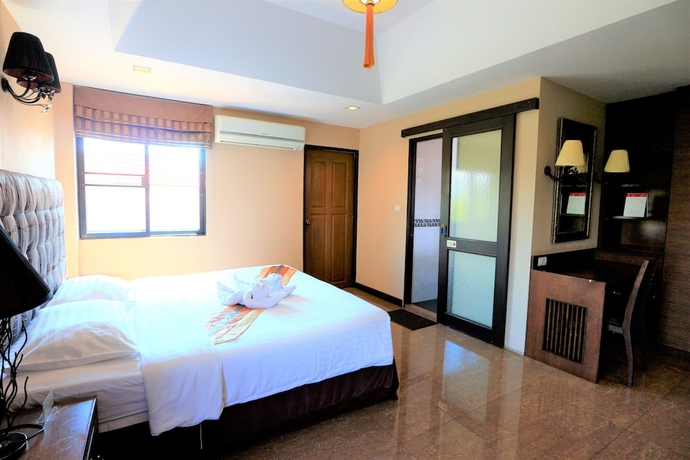 Imagen de la habitación del Hotel At Home At Chiang Mai. Foto 13