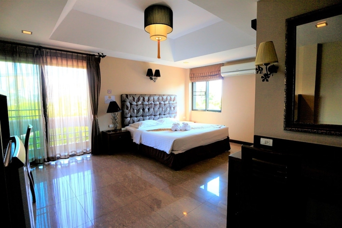 Imagen de la habitación del Hotel At Home At Chiang Mai. Foto 14