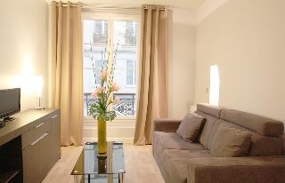 Imagen de la habitación del Hotel At Home Hotel Paris Center. Foto 11