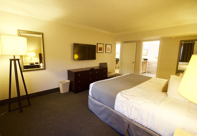 Imagen de la habitación del Hotel At Home Inn And Suites. Foto 2