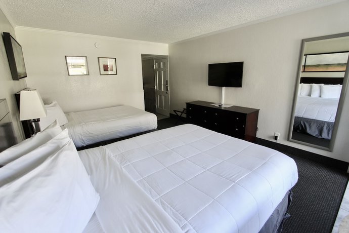 Imagen de la habitación del Hotel At Home Inn And Suites. Foto 3