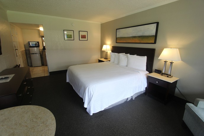 Imagen de la habitación del Hotel At Home Inn And Suites. Foto 4