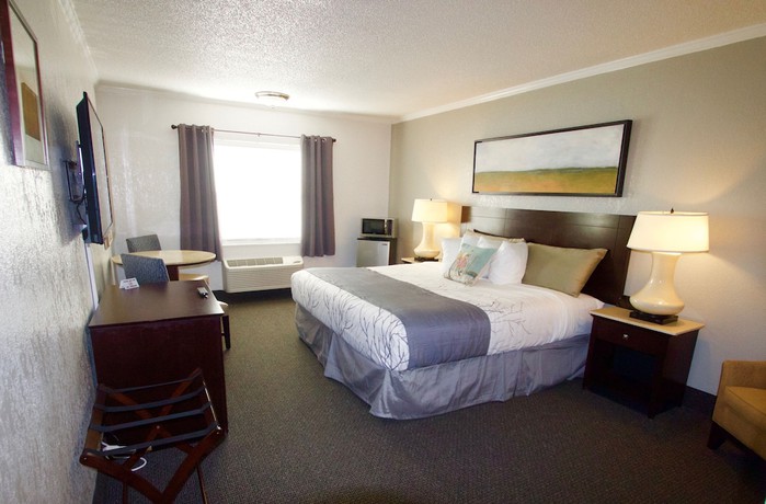 Imagen de la habitación del Hotel At Home Inn And Suites. Foto 6