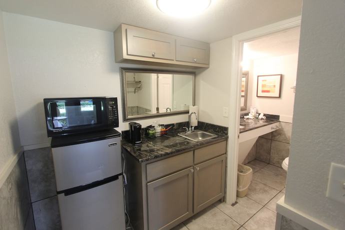 Imagen de la habitación del Hotel At Home Inn And Suites. Foto 7