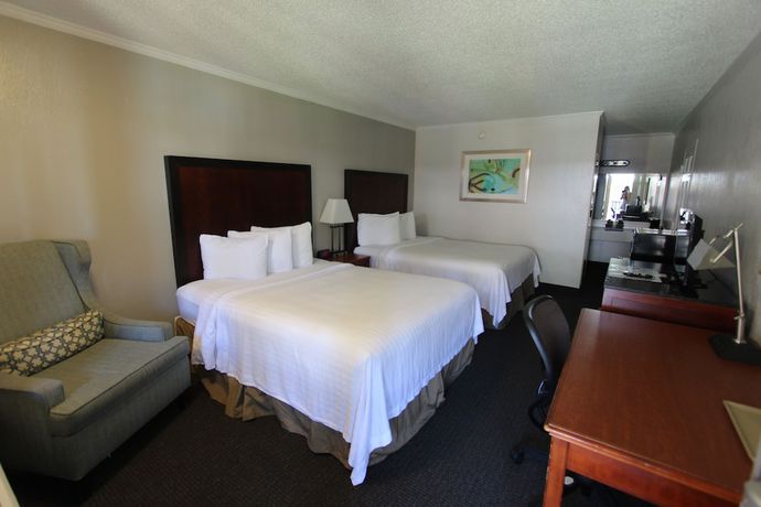 Imagen de la habitación del Hotel At Home Inn And Suites. Foto 9