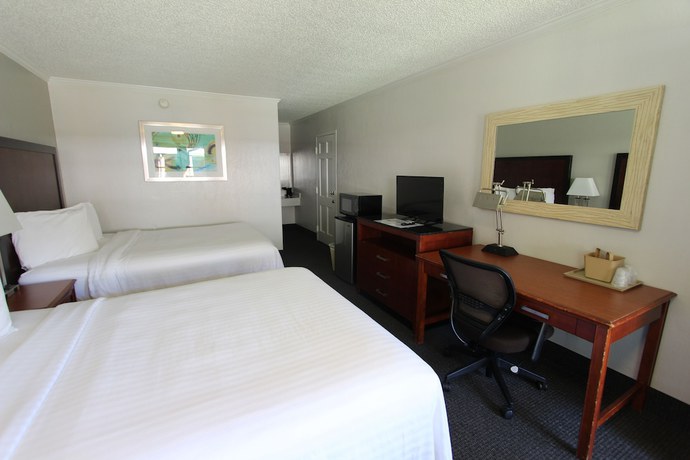 Imagen de la habitación del Hotel At Home Inn And Suites. Foto 10