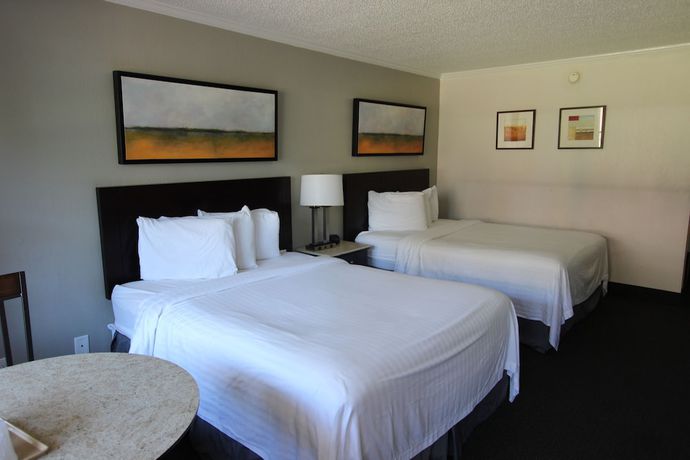 Imagen de la habitación del Hotel At Home Inn And Suites. Foto 11