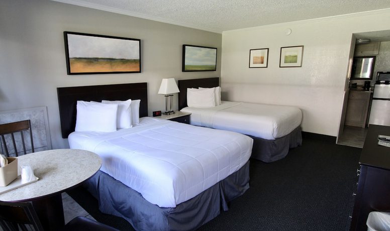 Imagen de la habitación del Hotel At Home Inn And Suites. Foto 12
