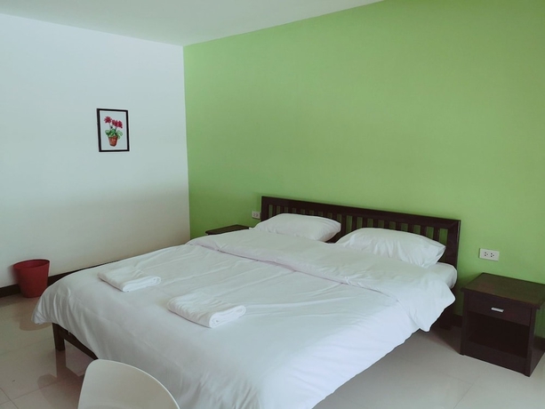 Imagen de la habitación del Hotel At Home Place. Foto 5