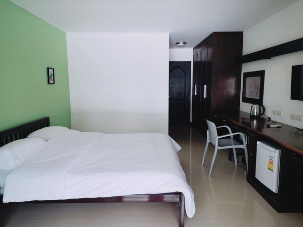 Imagen de la habitación del Hotel At Home Place. Foto 6