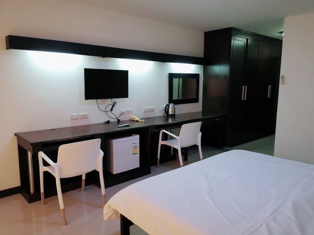 Imagen de la habitación del Hotel At Home Place. Foto 8