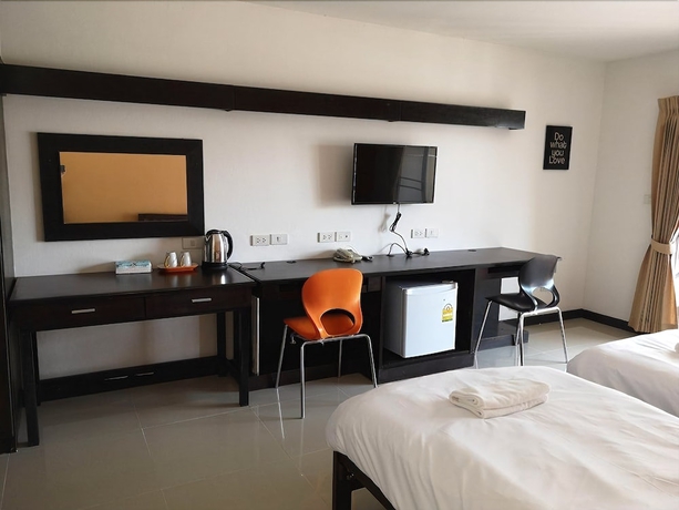 Imagen de la habitación del Hotel At Home Place. Foto 10