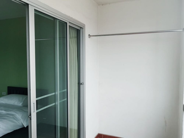 Imagen de la habitación del Hotel At Home Place. Foto 11