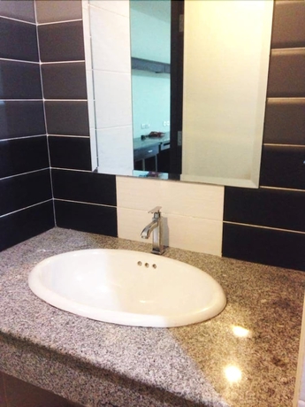 Imagen de la habitación del Hotel At Home Place. Foto 13