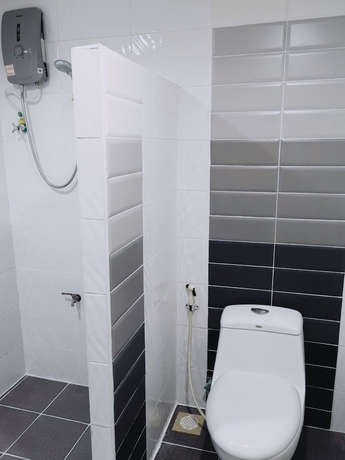 Imagen de la habitación del Hotel At Home Place. Foto 14