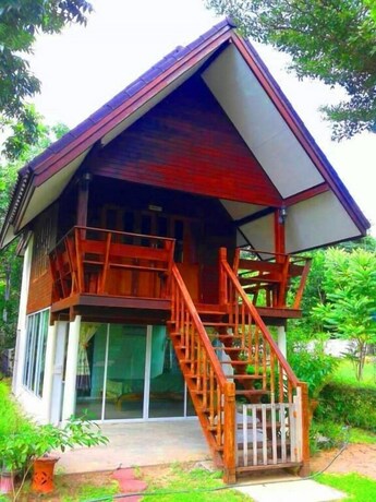 Imagen de la habitación del Hotel At Home Suanphung. Foto 22