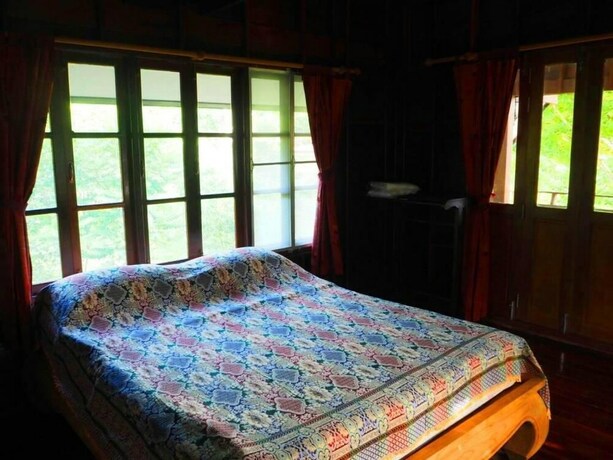 Imagen de la habitación del Hotel At Home Suanphung. Foto 28