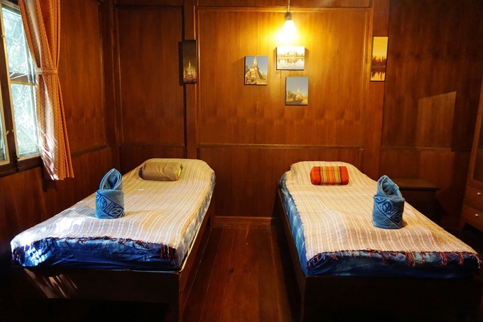 Imagen de la habitación del Hotel At Home Sukhothai. Foto 8