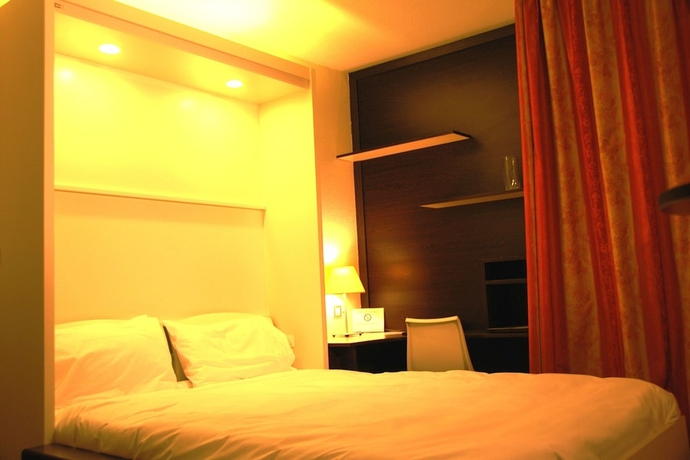 Imagen de la habitación del Hotel At Home, Toulouse. Foto 7