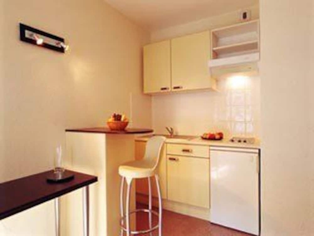 Imagen de la habitación del Hotel At Home, Toulouse. Foto 8