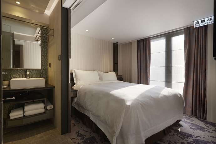 Imagen de la habitación del Hotel At Home Ximen. Foto 7