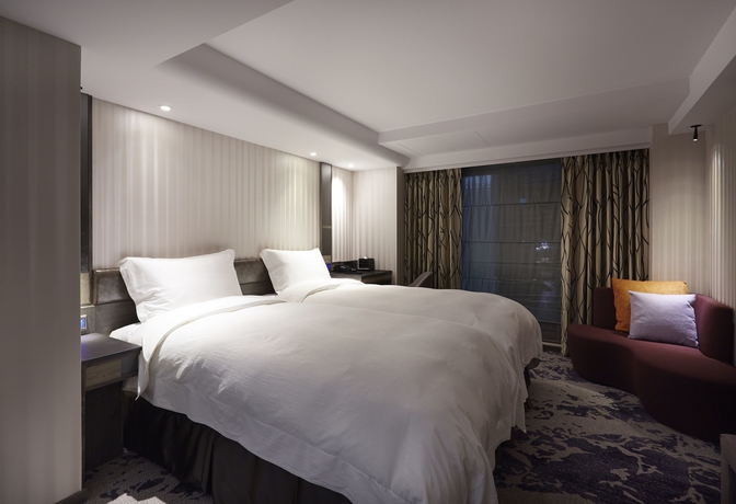 Imagen de la habitación del Hotel At Home Ximen. Foto 8