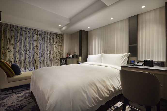 Imagen de la habitación del Hotel At Home Ximen. Foto 11