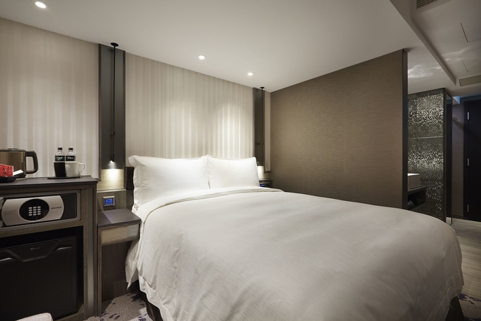 Imagen de la habitación del Hotel At Home Ximen. Foto 12