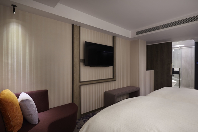 Imagen de la habitación del Hotel At Home Ximen. Foto 14