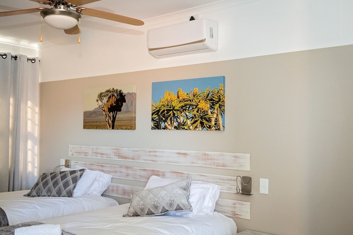 Imagen de la habitación del Hotel At Kronenhof Lodge. Foto 4