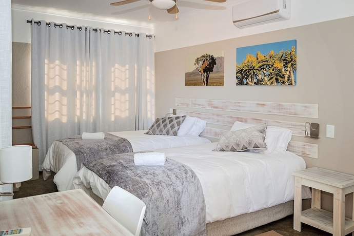Imagen de la habitación del Hotel At Kronenhof Lodge. Foto 5