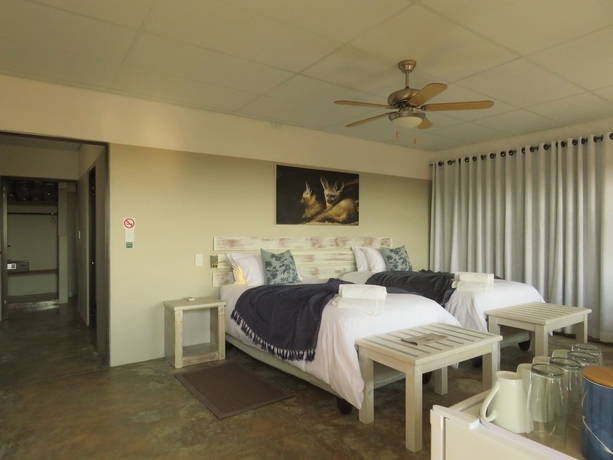 Imagen de la habitación del Hotel At Kronenhof Lodge. Foto 9