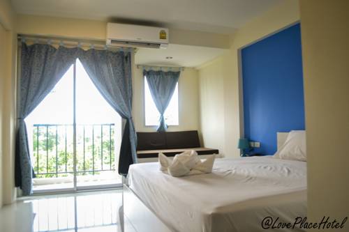 Imagen de la habitación del Hotel At Love Place. Foto 2