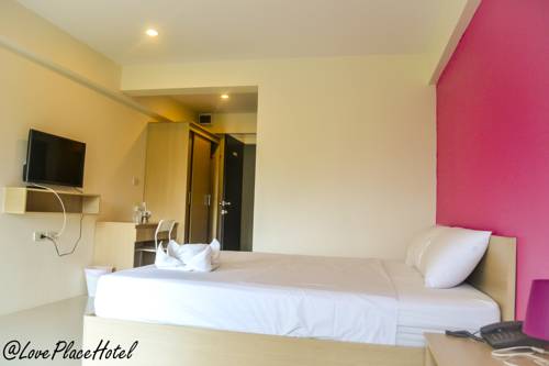 Imagen de la habitación del Hotel At Love Place. Foto 5