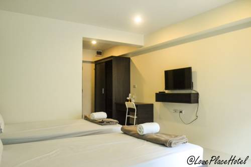 Imagen de la habitación del Hotel At Love Place. Foto 7
