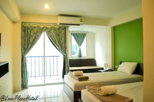 Imagen de la habitación del Hotel At Love Place. Foto 9