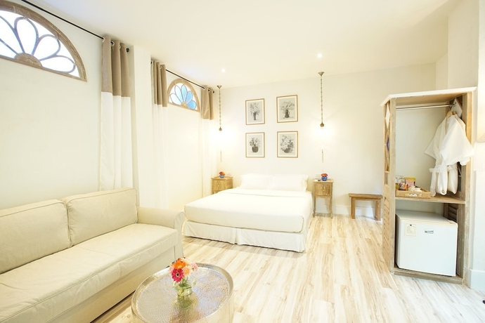 Imagen de la habitación del Hotel At Niman Conceptual Home. Foto 6