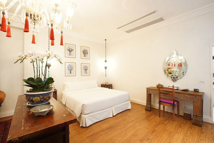 Imagen de la habitación del Hotel At Niman Conceptual Home. Foto 11