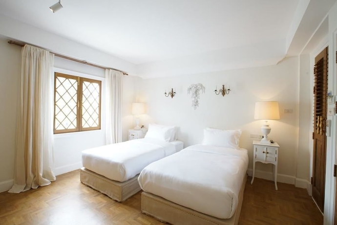 Imagen de la habitación del Hotel At Niman Conceptual Home. Foto 14